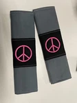 Universal Safety Belt Shoulder Straps Comfortable Cushion Pink Peace. Fixed Price $12.99.