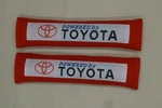 2x New Red Car Seat Belt Cover Shoulder Pads "powered By Toyota" 10.5"x2.5". Fixed Price $12.98.